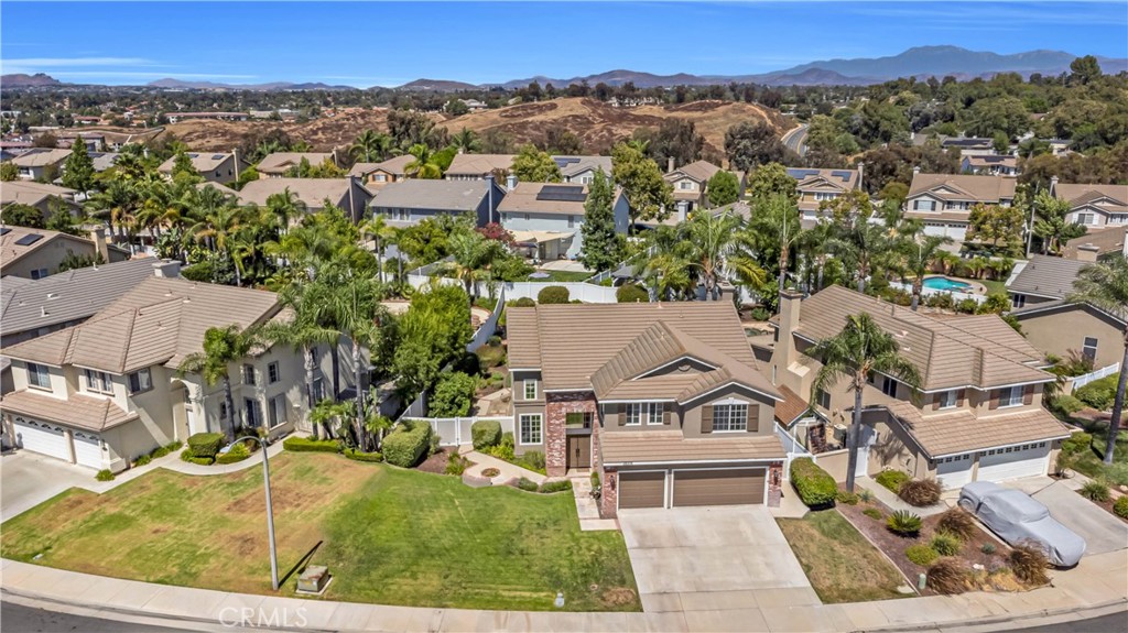 28308 Corte Ocaso Temecula, CA 92592 - Photo 41 of 43 an aerial view of residential houses with outdoor space and trees