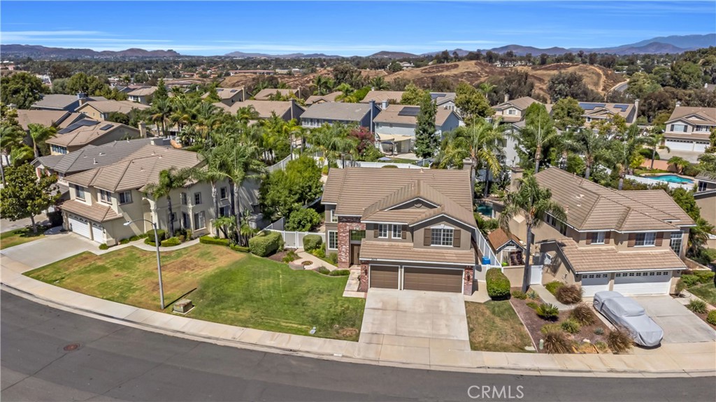 28308 Corte Ocaso Temecula, CA 92592 - Photo 5 of 43 an aerial view of residential houses with outdoor space and parking