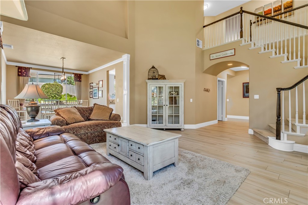 28308 Corte Ocaso Temecula, CA 92592 - Photo 10 of 43 a living room with furniture and a large window