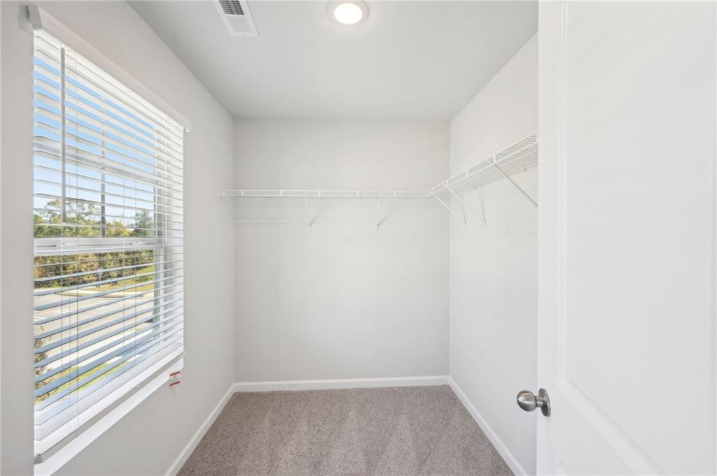11124 Suria Drive Covington, GA 30014 - Photo 25 of 31 a view of a room that has a window in it