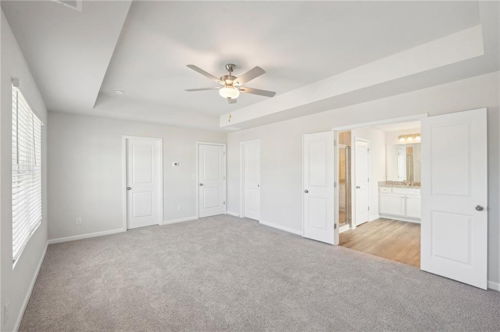11124 Suria Drive Covington, GA 30014 - Photo 28 of 31 a view of an empty room with a window