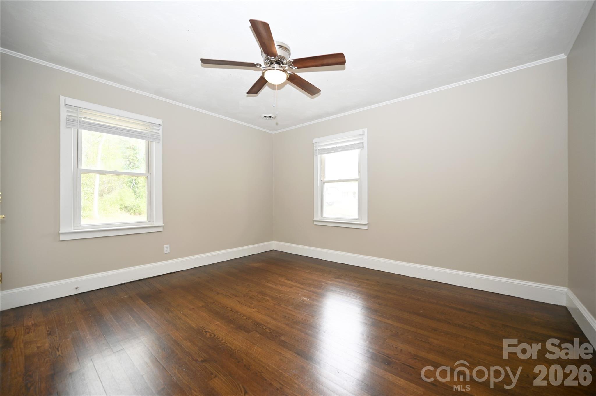 114 Gaston Street Chester, SC 29706 - Photo 10 of 15 a view of a livingroom with wooden floor and a window