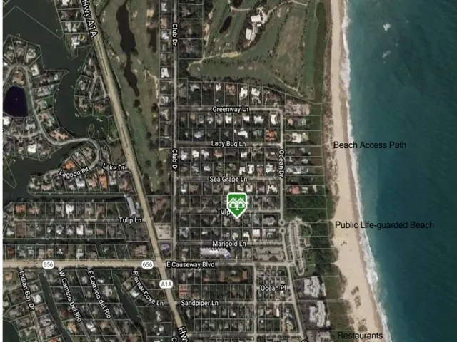 a kitchen with a sink and a stove top oven