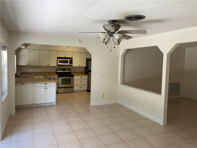 a view of livingroom with furniture and window