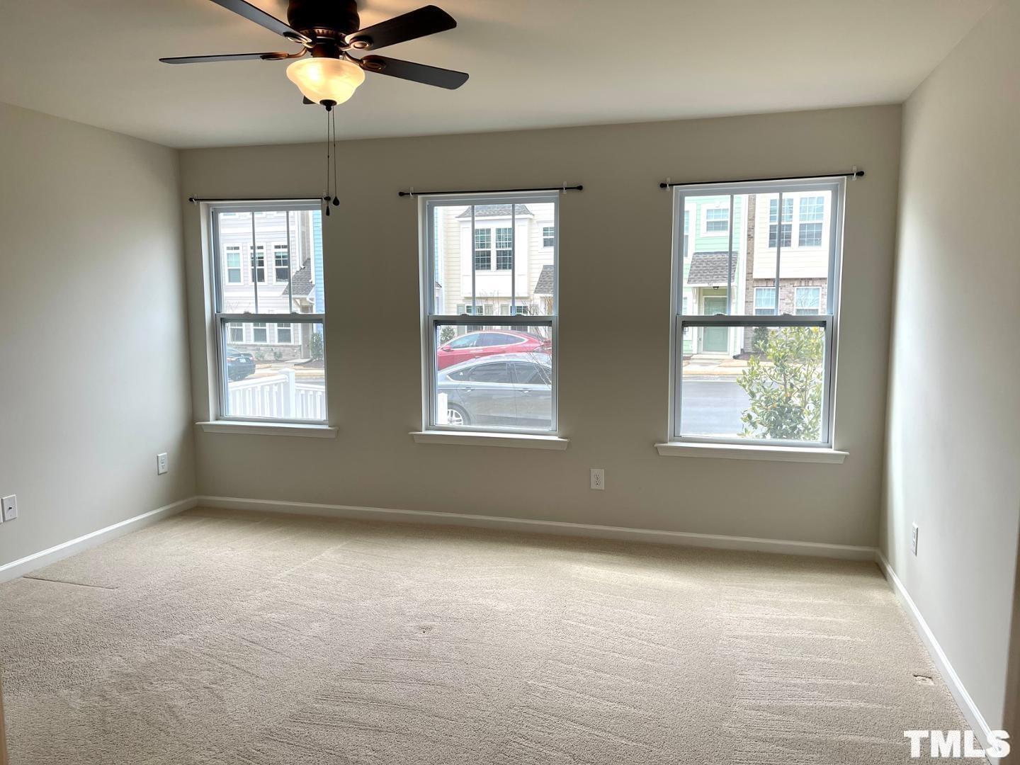 343 Great Northern Station Apex, NC 27502 - Photo 26 of 29 a view of an empty room with a window