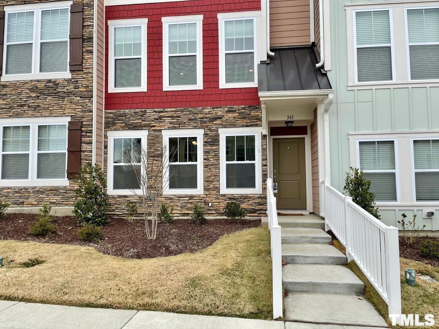 343 Great Northern Station Apex, NC 27502 - Photo 3 of 29 front view of a brick building