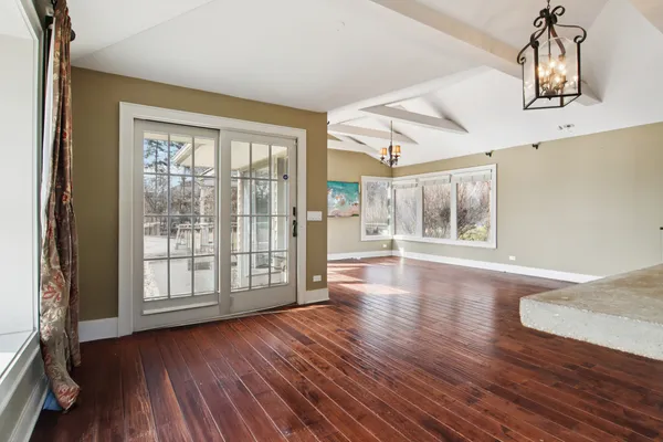 a kitchen with stainless steel appliances a refrigerator and microwave