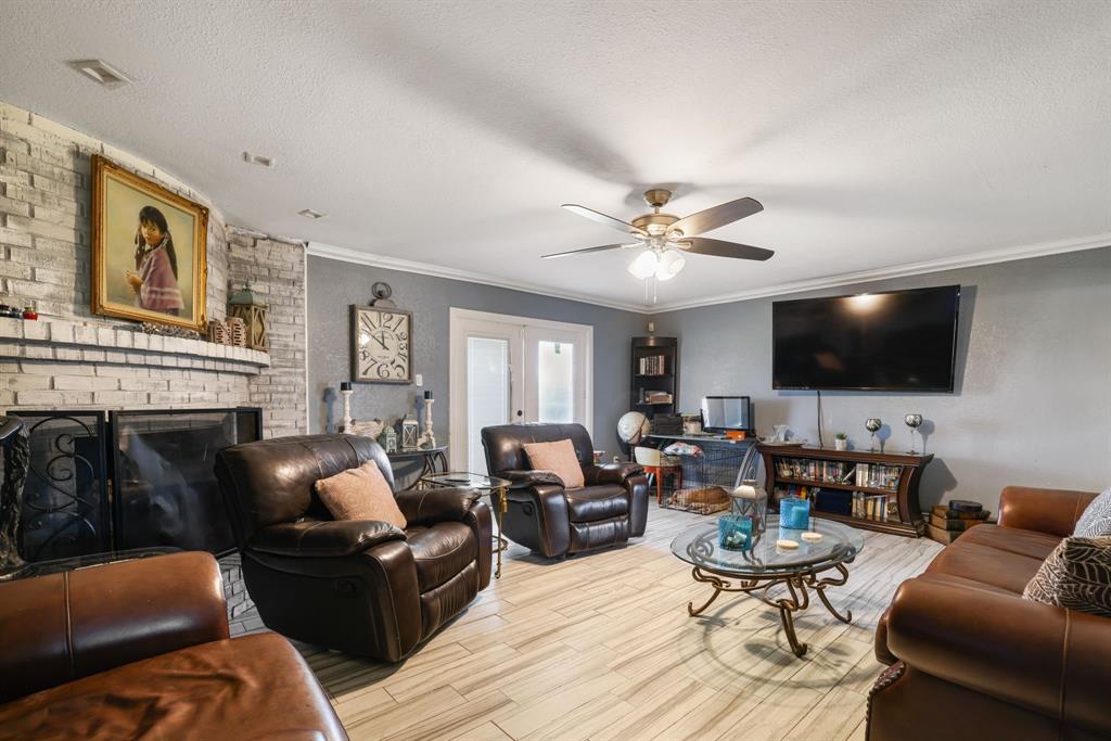 12475 Fm 2728 Terrell, TX 75161 - Photo 12 of 27 a living room with furniture and a flat screen tv