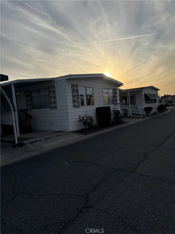 a view of house with outdoor space