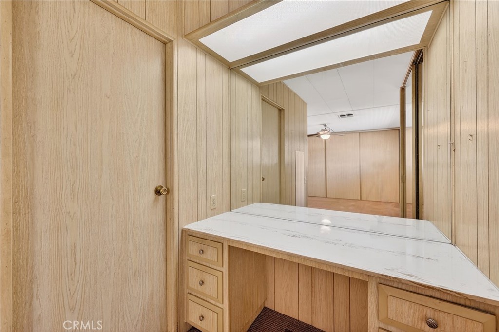1001 East Lambert Road, Unit 258 La Habra, CA 90631 - Photo 25 of 75 a bathroom with a sink and a mirror