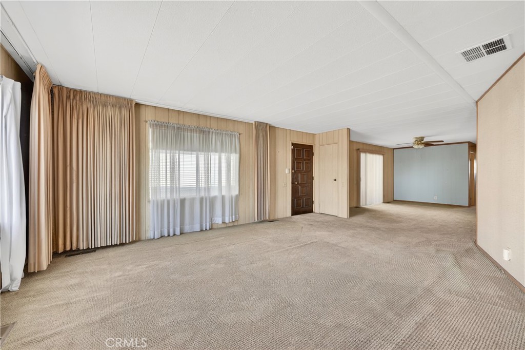 1001 East Lambert Road, Unit 258 La Habra, CA 90631 - Photo 5 of 75 an empty room with windows