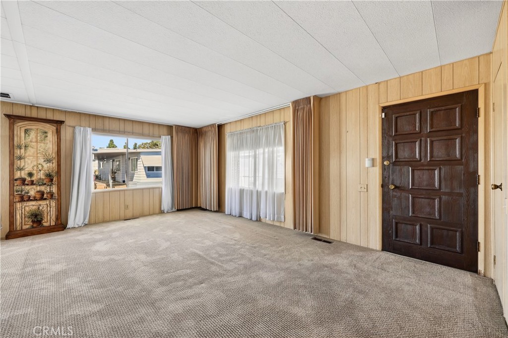 1001 East Lambert Road, Unit 258 La Habra, CA 90631 - Photo 6 of 75 an empty room with windows and closet