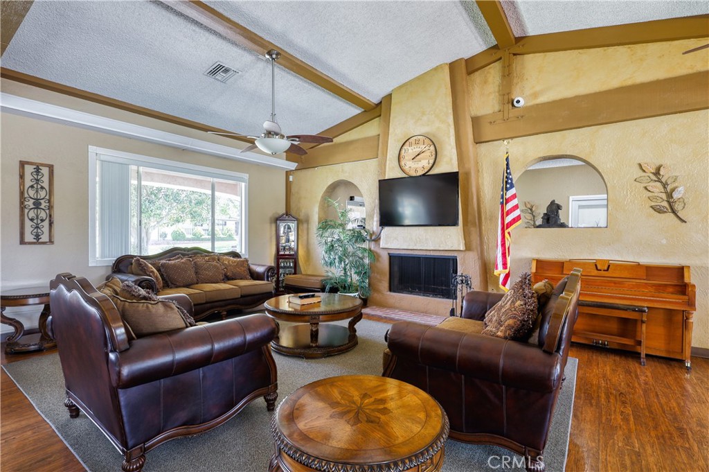 1001 East Lambert Road, Unit 258 La Habra, CA 90631 - Photo 74 of 75 a living room with furniture and a fireplace