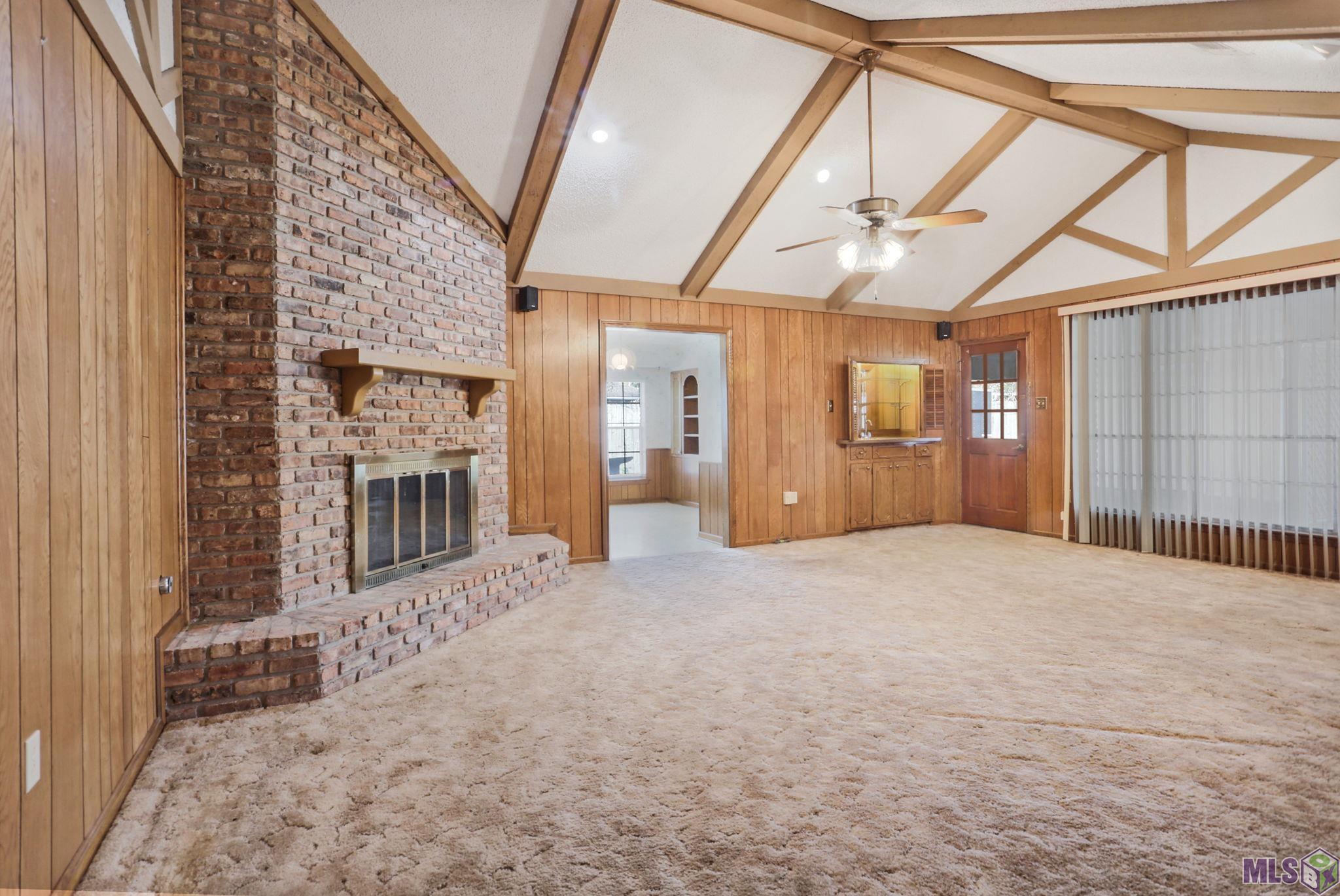 4522 Inchbrook Drive Baton Rouge, LA 70816 - Photo 3 of 16 Den has wood burning fireplace and wet bar