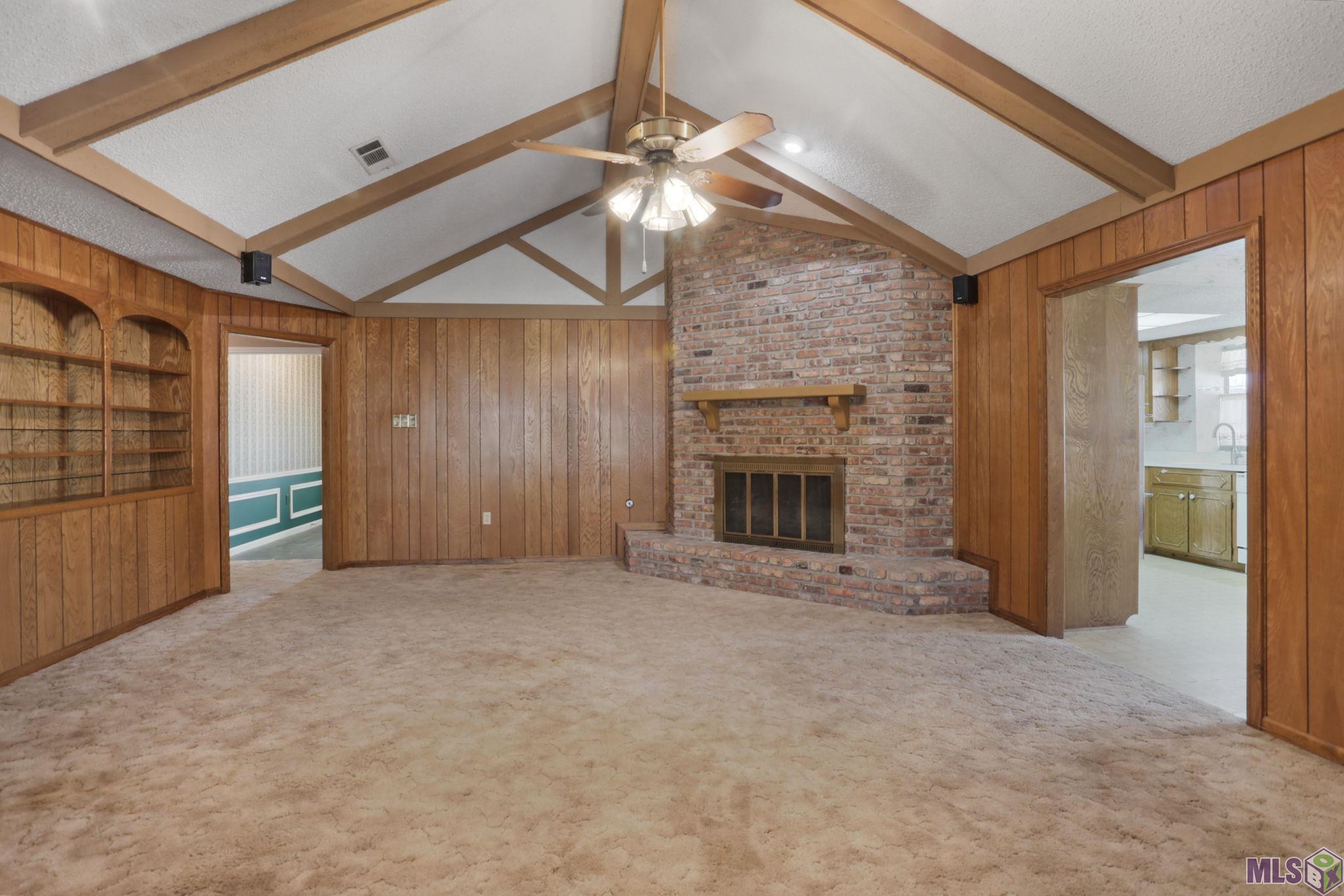 4522 Inchbrook Drive Baton Rouge, LA 70816 - Photo 5 of 16 Den has a wood burning fireplace