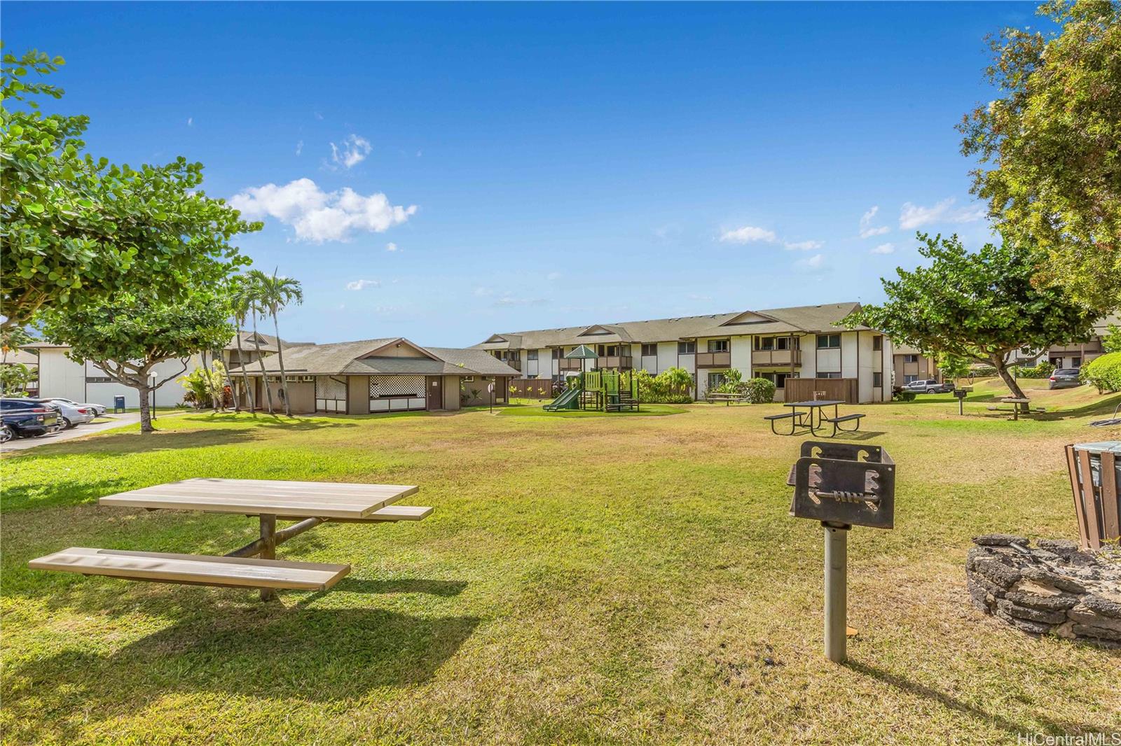 1233 Ala Alii Street, Unit 5 Honolulu, HI 96818 - Photo 11 of 16 a swimming pool with outdoor seating and yard