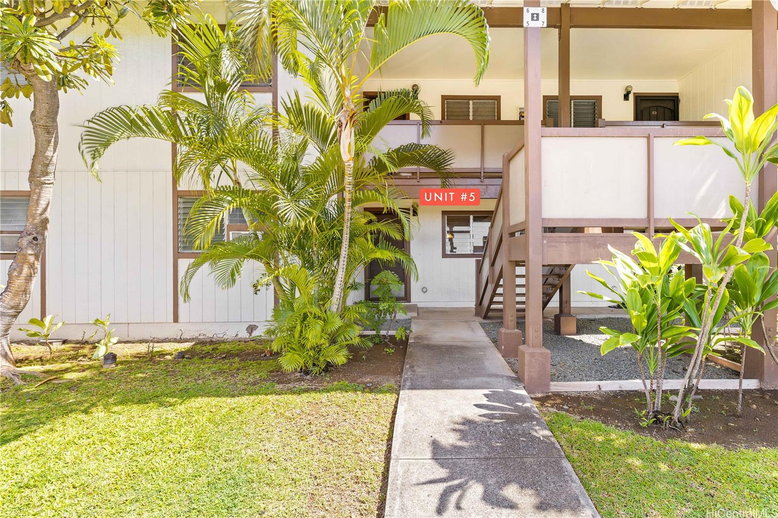 1233 Ala Alii Street, Unit 5 Honolulu, HI 96818 - Photo 8 of 16 a building with trees in front of it