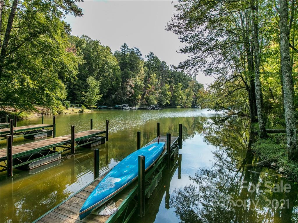 1964 Parkway North Rd Mill Spring Mill Spring, NC 28756 - Photo 18 of 19 a view of a lake with chairs