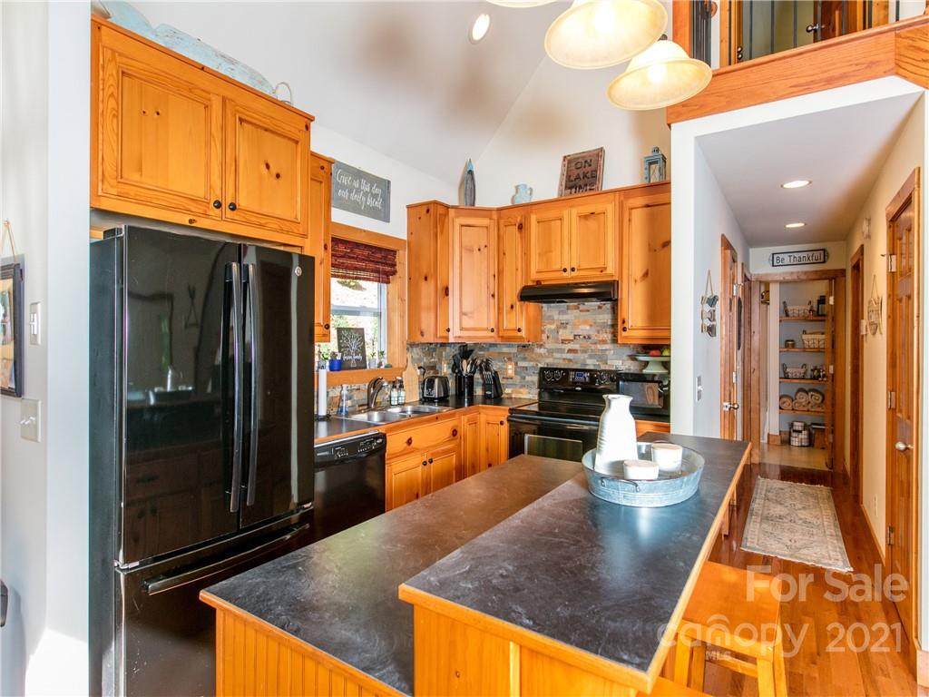 1964 Parkway North Rd Mill Spring Mill Spring, NC 28756 - Photo 10 of 19 a large kitchen with lots of counter space