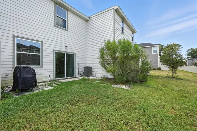 a house view with a garden space