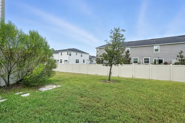 a picture of a bench in front of a wall