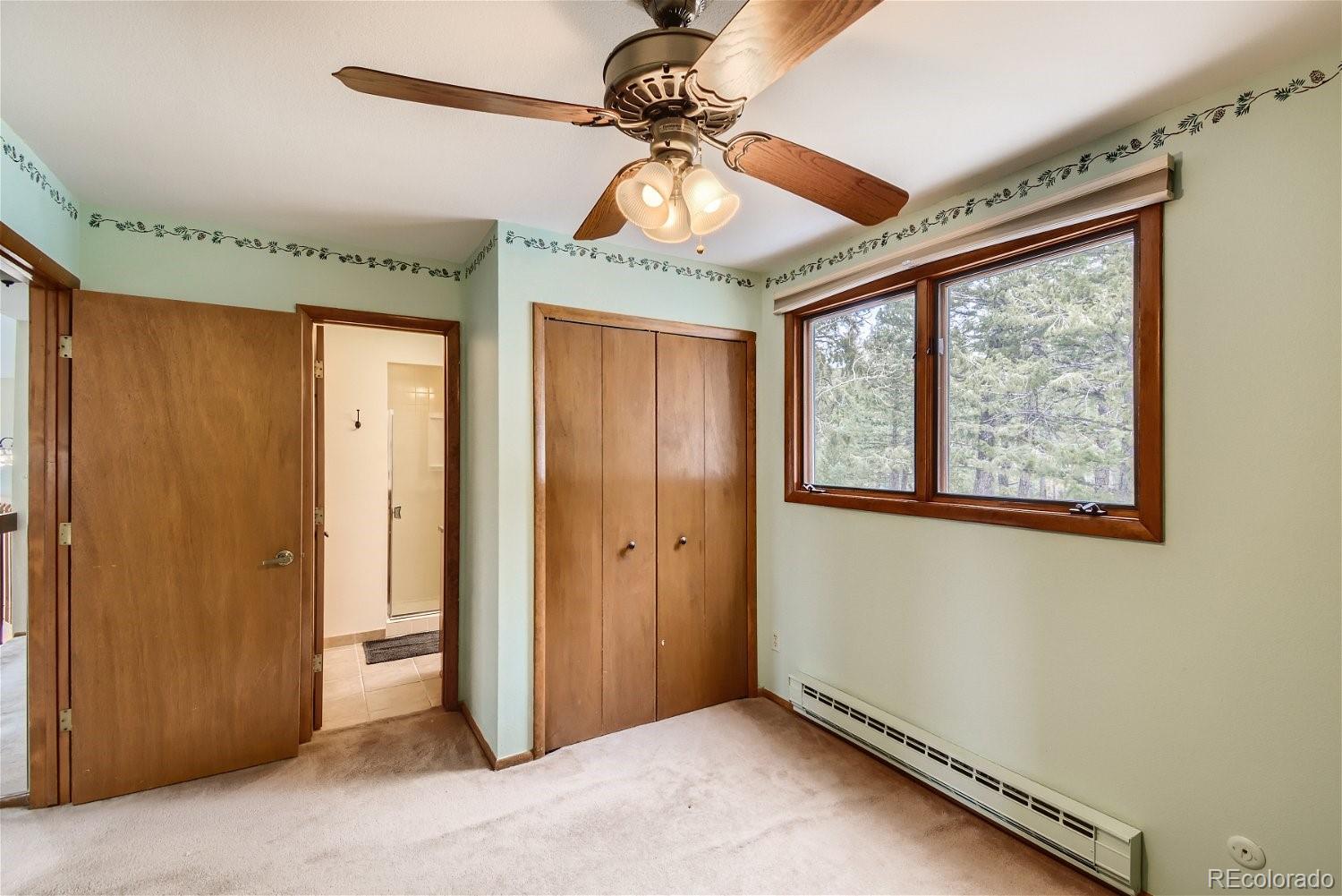 25756 Zugspitz Road Evergreen, CO 80439 - Photo 17 of 31 a very nice looking room with a window