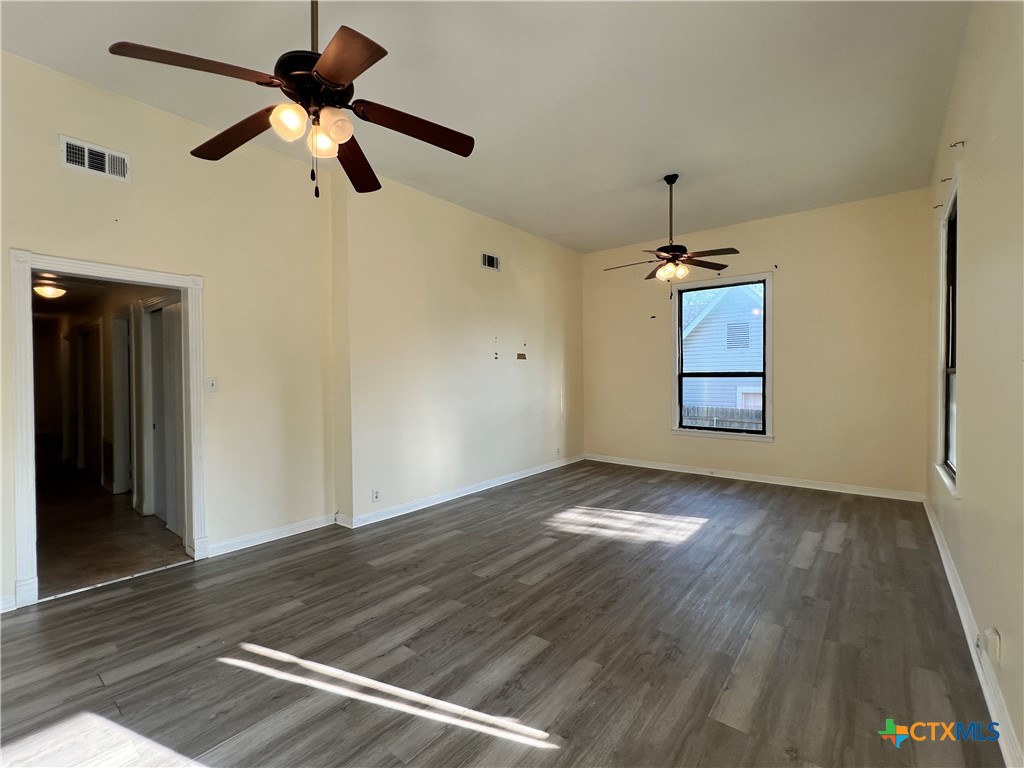 902 North 1st Street Temple, TX 76501 - Photo 24 of 29 a view of empty room with wooden floor