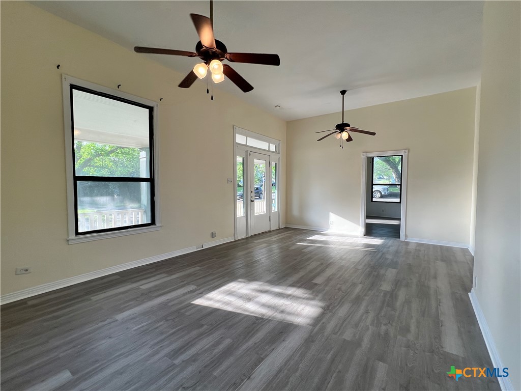 902 North 1st Street Temple, TX 76501 - Photo 25 of 29 a view of an empty room with window and wooden floor