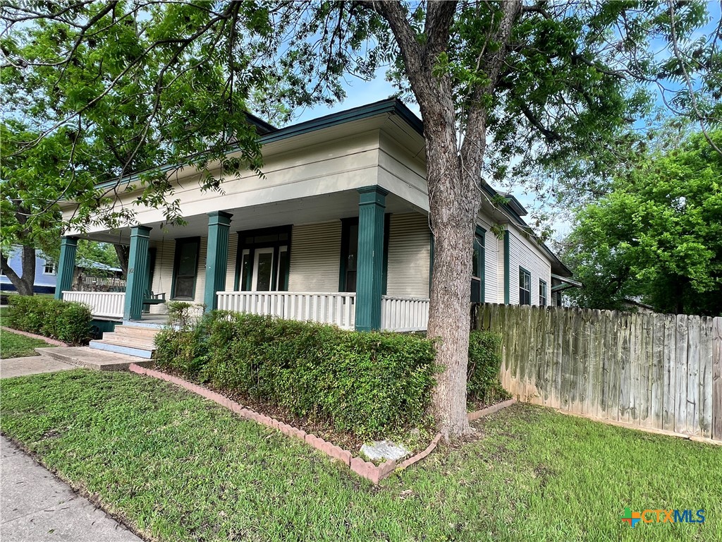902 North 1st Street Temple, TX 76501 - Photo 3 of 29 front view of a house with a yard