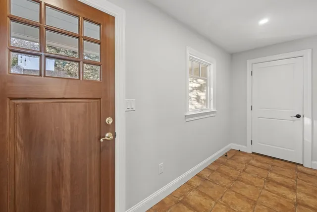 a view of empty room with windows