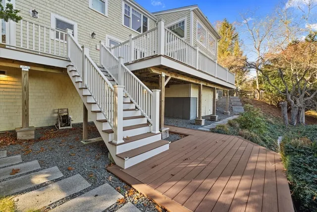 a view of a balcony with wooden floor