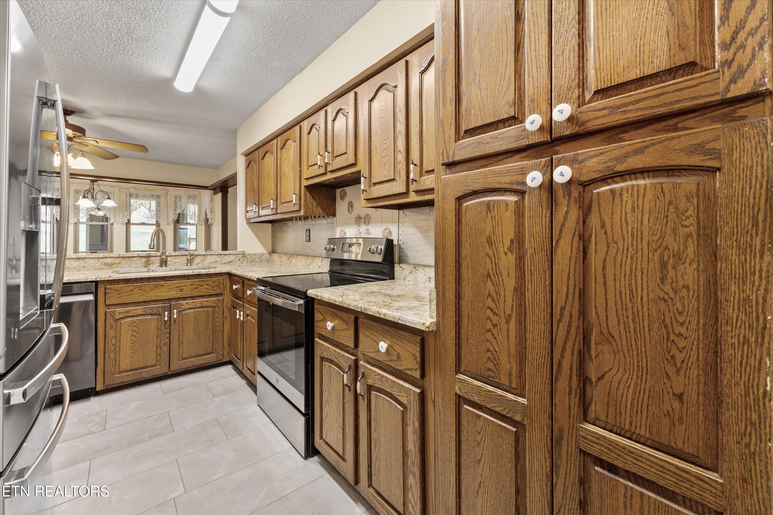 129 Pleasant Hill Road Sweetwater, TN 37874 - Photo 11 of 38 Generous Cabinetry in Kitchen