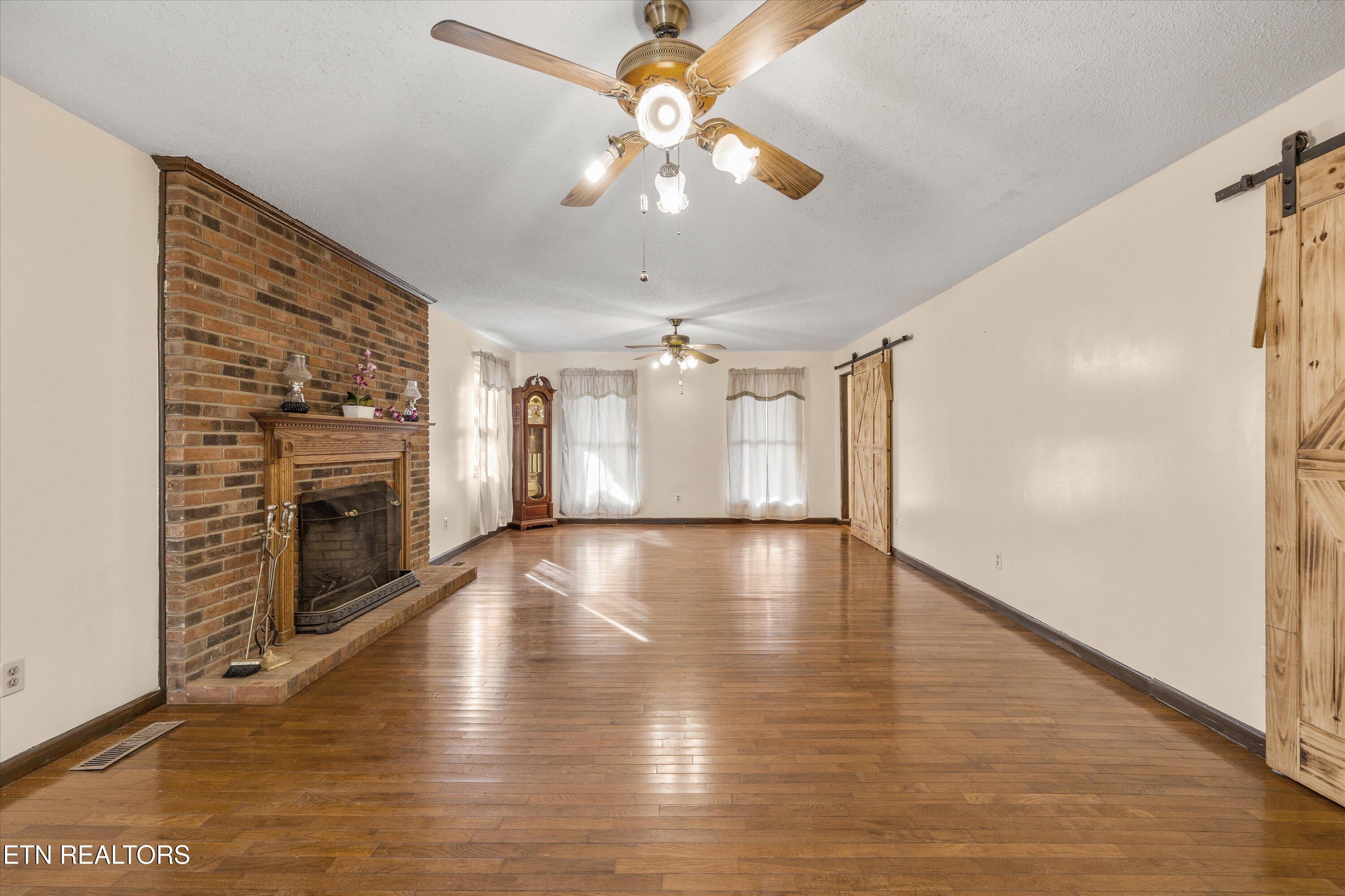 129 Pleasant Hill Road Sweetwater, TN 37874 - Photo 5 of 38 Grand Living Space with Fireplace