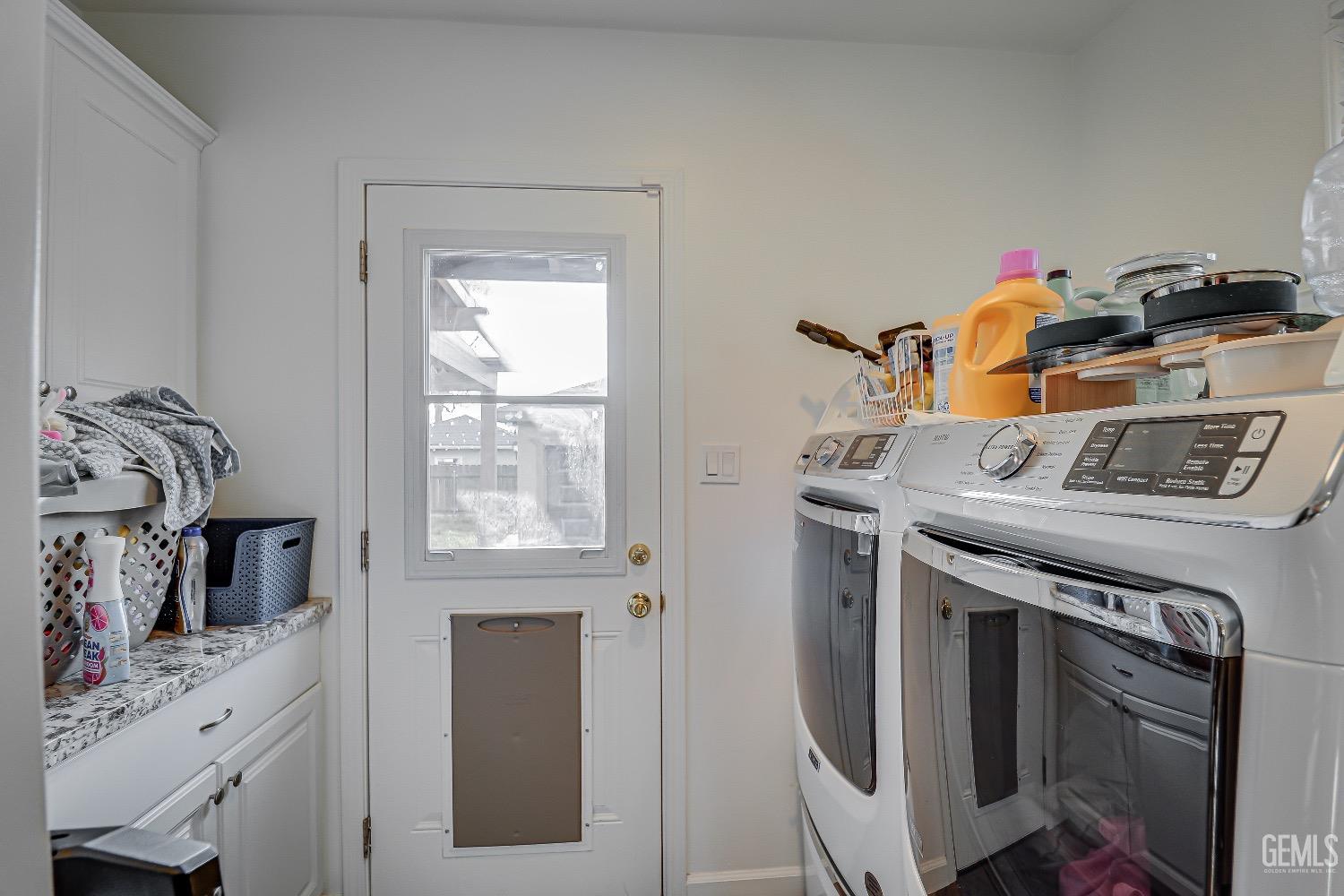 Undisclosed Address Bakersfield, CA 93304 - Photo 12 of 26 a utility room with dryer and washer