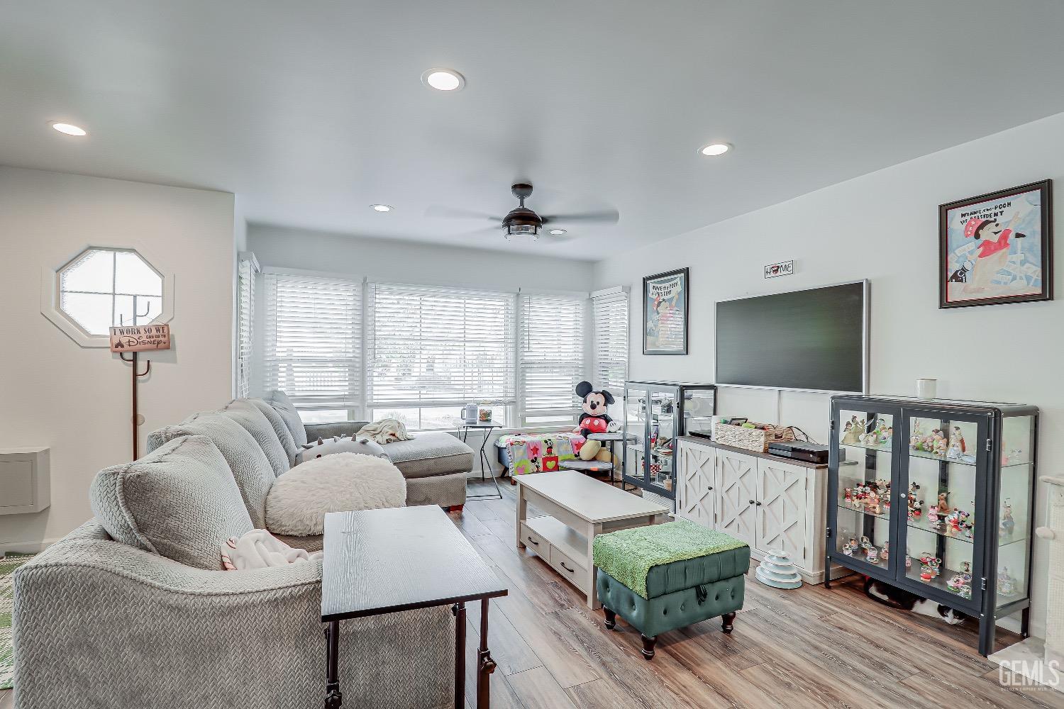 Undisclosed Address Bakersfield, CA 93304 - Photo 4 of 26 a living room with furniture and a flat screen tv