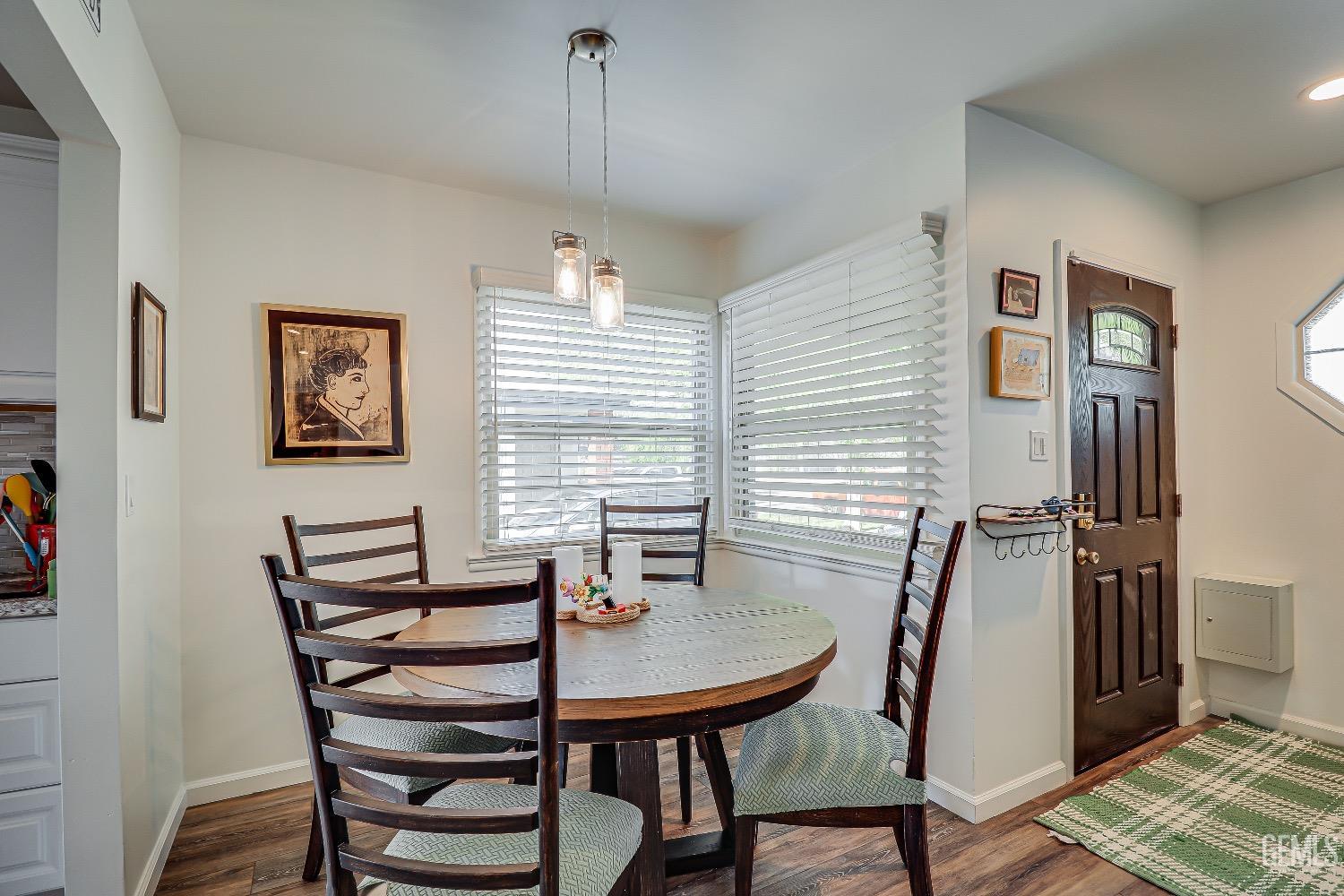 Undisclosed Address Bakersfield, CA 93304 - Photo 8 of 26 a view of a dining room with furniture and window