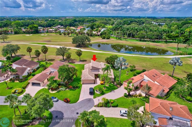 Boca West Boca Raton, FL 33434 - Photo 6 of 11 an aerial view of a house with a garden and lake view