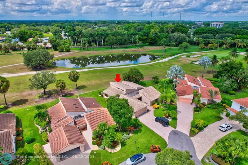 Boca West Boca Raton, FL 33434 - Photo 7 of 11 an aerial view of a house with a garden and lake view
