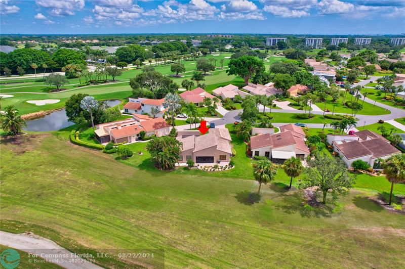 Boca West Boca Raton, FL 33434 - Photo 10 of 11 a view of a bunch of flower plants and lawn chairs