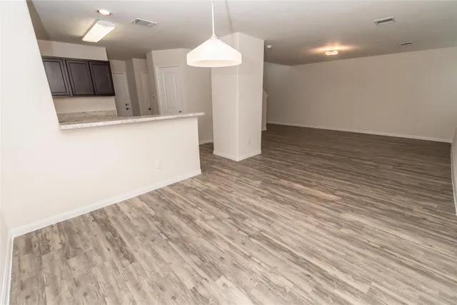 a view of a kitchen with a sink and a dishwasher