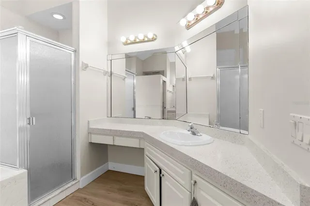 a kitchen with granite countertop cabinets and sink