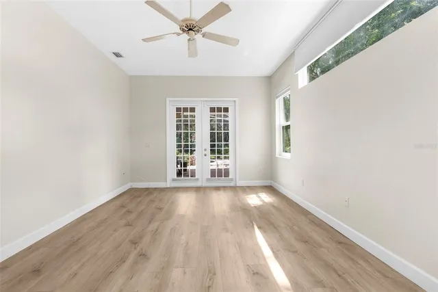 a bathroom with a sink vanity and a mirror