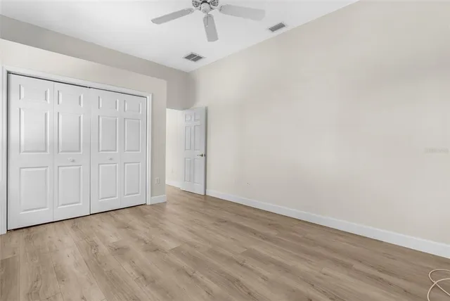 a kitchen with granite countertop cabinets and sink