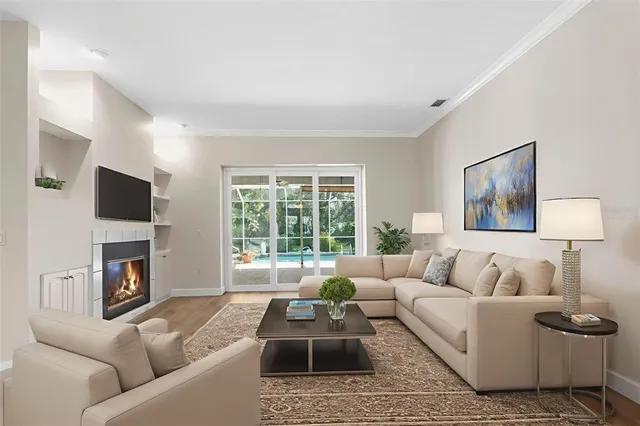 a view of room with window and wooden floor