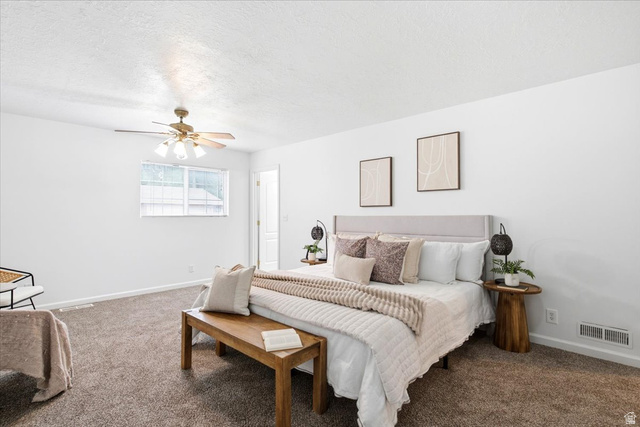 1341 29th Street Ogden, UT 84403 - Photo 15 of 37 Spacious room featuring neutral carpeting, white walls, and a ceiling fan with integrated lighting