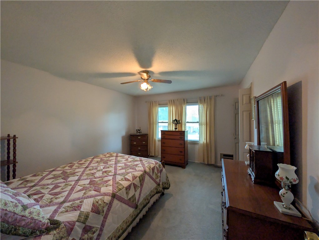 1000 Hickory Lane Anderson, SC 29624 - Photo 10 of 37 This spacious bedroom offers ample natural light and a comfortable atmosphere for rest and relaxation.