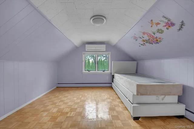 a room with a bed and a window