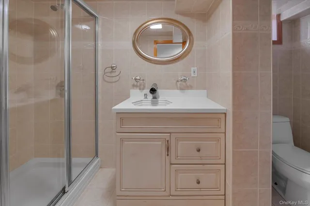 a bathroom with a sink a vanity and a mirror