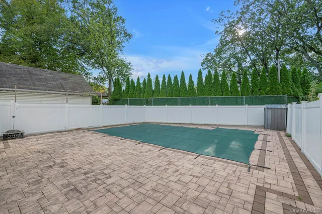 a view of backyard with green space