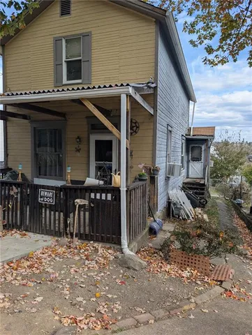 a view of a house with a patio